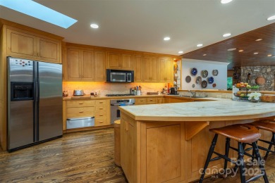 A rare opportunity awaits you in this secluded gem. You can live on Biltmore Forest Country Club in North Carolina - for sale on GolfHomes.com, golf home, golf lot