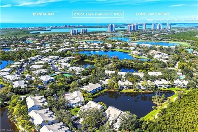 A SPECIAL UNIT WITH STUNNING LAKE VIEWS and NO FLOOD DAMAGE from on Bonita Bay West in Florida - for sale on GolfHomes.com, golf home, golf lot