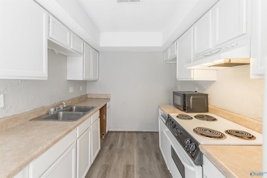 INVESTOR GOLDMINE - 2BR/1.5BA 2-Story Condo in South on Becky Peirce Municipal Golf Course in Alabama - for sale on GolfHomes.com, golf home, golf lot