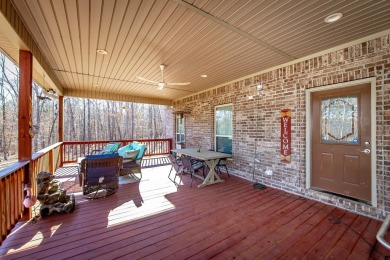 Discover your dream retreat on the picturesque shores of Greers on Thunderbird Country Club in Arkansas - for sale on GolfHomes.com, golf home, golf lot