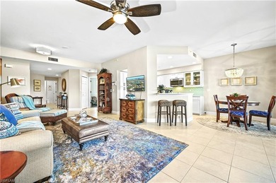 A SPECIAL UNIT WITH STUNNING LAKE VIEWS and NO FLOOD DAMAGE from on Bonita Bay West in Florida - for sale on GolfHomes.com, golf home, golf lot