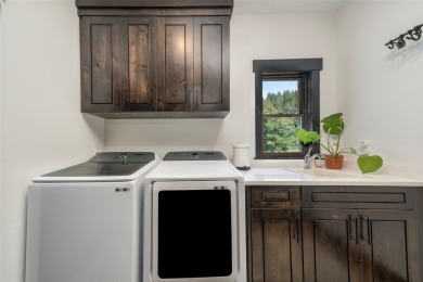 Magnificent custom single-story golf-front home in the private on Eagle Bend Golf Course in Montana - for sale on GolfHomes.com, golf home, golf lot