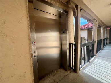 HIGH  DRY 2BR/1BA 3RD FLOOR Condo with detached garage and on Feather Sound Country Club in Florida - for sale on GolfHomes.com, golf home, golf lot