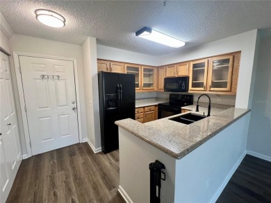 HIGH  DRY 2BR/1BA 3RD FLOOR Condo with detached garage and on Feather Sound Country Club in Florida - for sale on GolfHomes.com, golf home, golf lot