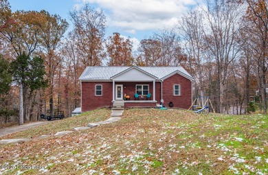 Welcome to 68 Lonnie Lawson Ct located in the gated community of on Doe Valley Country Club in Kentucky - for sale on GolfHomes.com, golf home, golf lot