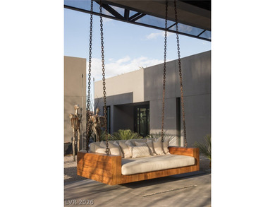 Pristine symmetrical landscaping paves your entrance into this on Bears Best Las Vegas Golf Club in Nevada - for sale on GolfHomes.com, golf home, golf lot