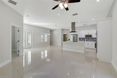 Set back on a private 1.14-acre lot, this beautifully designed on The Club At Twin Eagles in Florida - for sale on GolfHomes.com, golf home, golf lot