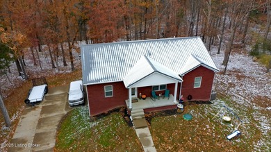 Welcome to 68 Lonnie Lawson Ct located in the gated community of on Doe Valley Country Club in Kentucky - for sale on GolfHomes.com, golf home, golf lot