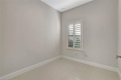 Set back on a private 1.14-acre lot, this beautifully designed on The Club At Twin Eagles in Florida - for sale on GolfHomes.com, golf home, golf lot