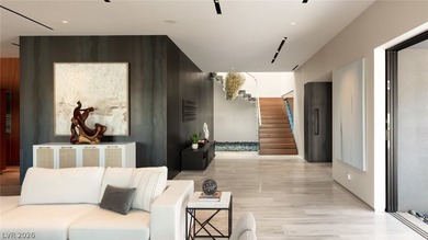 Pristine symmetrical landscaping paves your entrance into this on Bears Best Las Vegas Golf Club in Nevada - for sale on GolfHomes.com, golf home, golf lot