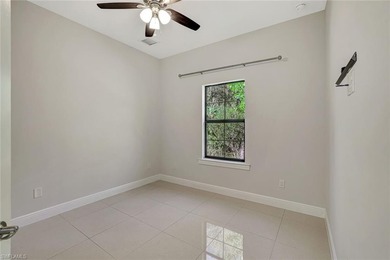 Set back on a private 1.14-acre lot, this beautifully designed on The Club At Twin Eagles in Florida - for sale on GolfHomes.com, golf home, golf lot