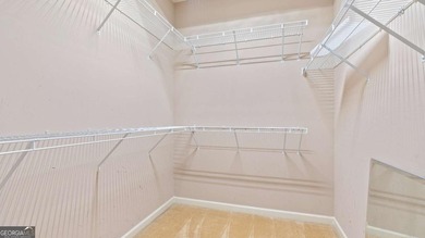 Discover this beautifully maintained 5-bedroom, 3.5 bath home on Summergrove Golf Club in Georgia - for sale on GolfHomes.com, golf home, golf lot