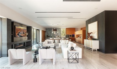 Pristine symmetrical landscaping paves your entrance into this on Bears Best Las Vegas Golf Club in Nevada - for sale on GolfHomes.com, golf home, golf lot