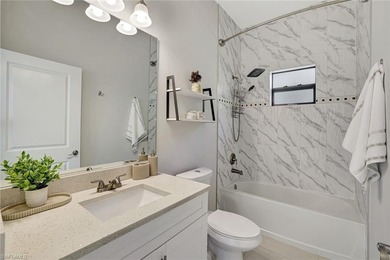 Set back on a private 1.14-acre lot, this beautifully designed on The Club At Twin Eagles in Florida - for sale on GolfHomes.com, golf home, golf lot