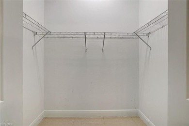 Set back on a private 1.14-acre lot, this beautifully designed on The Club At Twin Eagles in Florida - for sale on GolfHomes.com, golf home, golf lot