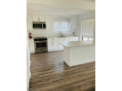 Completely Renovated 4 Bedroom 2 Bathroom End-Unit In Desirable on High Point Golf Club in New Jersey - for sale on GolfHomes.com, golf home, golf lot