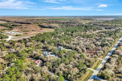 Set back on a private 1.14-acre lot, this beautifully designed on The Club At Twin Eagles in Florida - for sale on GolfHomes.com, golf home, golf lot