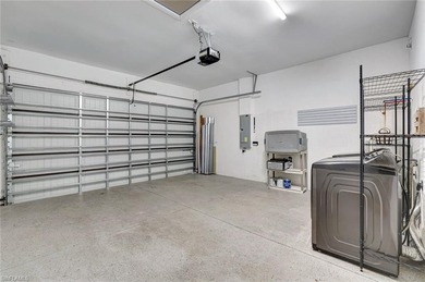 Set back on a private 1.14-acre lot, this beautifully designed on The Club At Twin Eagles in Florida - for sale on GolfHomes.com, golf home, golf lot