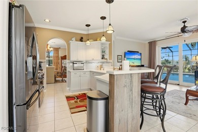 Located at 21543 Brixham Run Loop in the heart of Estero on Stoneybrook Golf Club in Florida - for sale on GolfHomes.com, golf home, golf lot