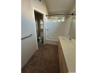 Welcome to this rarely available corner-lot home in Ocean on Hoakalei Country Club At Ocean Pointe in Hawaii - for sale on GolfHomes.com, golf home, golf lot