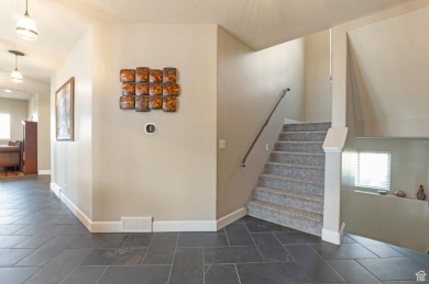 This beautiful Bountiful East Bench home has a large grassy on Eaglewood Golf Course in Utah - for sale on GolfHomes.com, golf home, golf lot