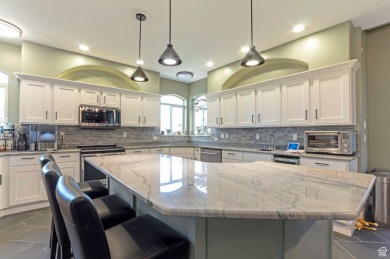 This beautiful Bountiful East Bench home has a large grassy on Eaglewood Golf Course in Utah - for sale on GolfHomes.com, golf home, golf lot