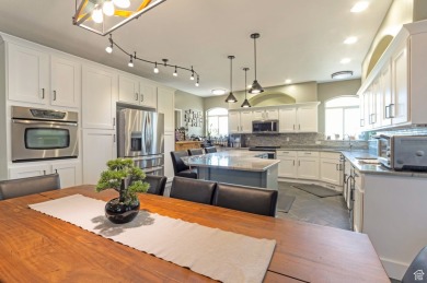This beautiful Bountiful East Bench home has a large grassy on Eaglewood Golf Course in Utah - for sale on GolfHomes.com, golf home, golf lot
