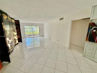 Welcome to Wynmoor, an active adult community offering on Wynmoor Golf Course in Florida - for sale on GolfHomes.com, golf home, golf lot