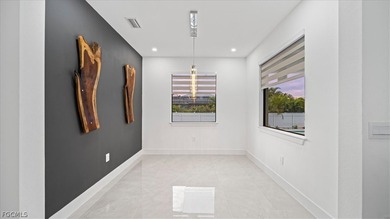 Welcome to your dream home! Nestled on a spacious lot,in front on Burnt Store Golf Club in Florida - for sale on GolfHomes.com, golf home, golf lot