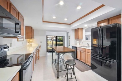 Furnished 2-bed, 2-bath waterfront villa in The Lakes of Deer on Deer Creek Golf Club in Florida - for sale on GolfHomes.com, golf home, golf lot