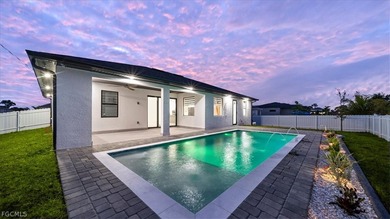 Welcome to your dream home! Nestled on a spacious lot,in front on Burnt Store Golf Club in Florida - for sale on GolfHomes.com, golf home, golf lot