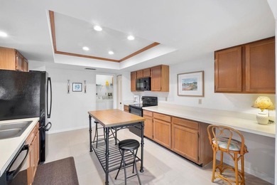 Furnished 2-bed, 2-bath waterfront villa in The Lakes of Deer on Deer Creek Golf Club in Florida - for sale on GolfHomes.com, golf home, golf lot