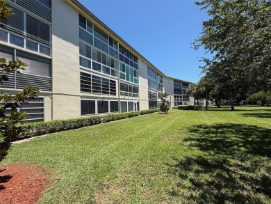 Welcome to Wynmoor, an active adult community offering on Wynmoor Golf Course in Florida - for sale on GolfHomes.com, golf home, golf lot