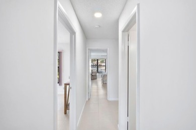 Furnished 2-bed, 2-bath waterfront villa in The Lakes of Deer on Deer Creek Golf Club in Florida - for sale on GolfHomes.com, golf home, golf lot