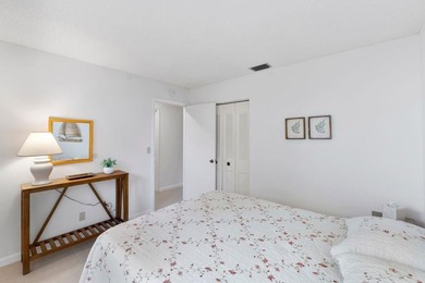 Furnished 2-bed, 2-bath waterfront villa in The Lakes of Deer on Deer Creek Golf Club in Florida - for sale on GolfHomes.com, golf home, golf lot