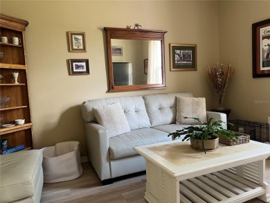 Beautifully maintained home in Solivita. Gorgeous landscaping on Stonegate Golf Club in Florida - for sale on GolfHomes.com, golf home, golf lot