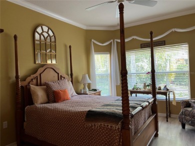 Beautifully maintained home in Solivita. Gorgeous landscaping on Stonegate Golf Club in Florida - for sale on GolfHomes.com, golf home, golf lot