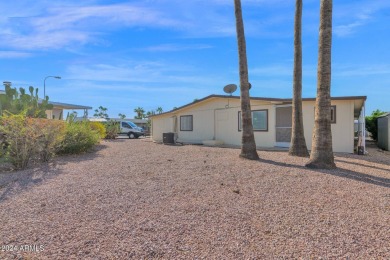 Beautiful move in ready 3 bedroom, 2 bath home with a bonus room on Apache Wells Country Club in Arizona - for sale on GolfHomes.com, golf home, golf lot