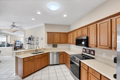 NOW AVAILABLE!!  NEW ROOF!  Come see this 3BD/2BA/2CG villa that on Pelican Pointe Golf and Country Club in Florida - for sale on GolfHomes.com, golf home, golf lot