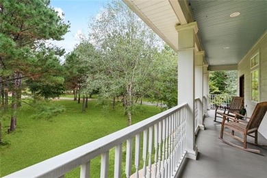 Nestled within the gates of Money Hill, this stunning two-story on Money Hill Golf and Country Club in Louisiana - for sale on GolfHomes.com, golf home, golf lot