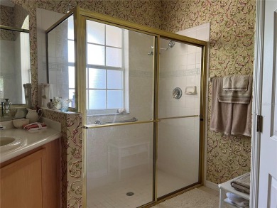 Beautifully maintained home in Solivita. Gorgeous landscaping on Stonegate Golf Club in Florida - for sale on GolfHomes.com, golf home, golf lot