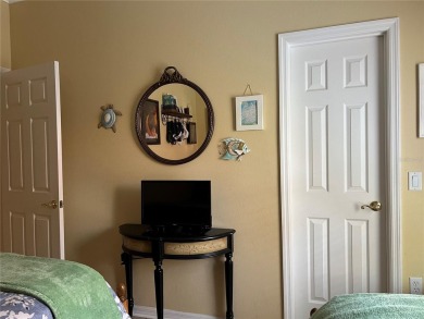 Beautifully maintained home in Solivita. Gorgeous landscaping on Stonegate Golf Club in Florida - for sale on GolfHomes.com, golf home, golf lot