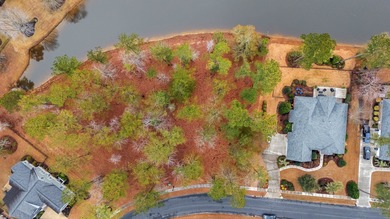 Build your dream home on this 0.89/ac water lot in the desirable on Heron Point Golf Club in South Carolina - for sale on GolfHomes.com, golf home, golf lot