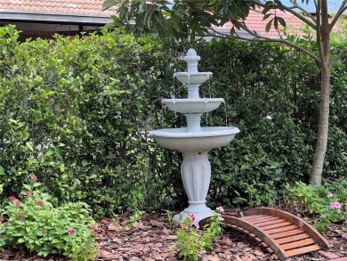 Beautifully maintained home in Solivita. Gorgeous landscaping on Stonegate Golf Club in Florida - for sale on GolfHomes.com, golf home, golf lot