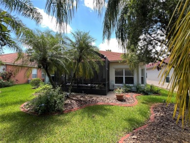 Beautifully maintained home in Solivita. Gorgeous landscaping on Stonegate Golf Club in Florida - for sale on GolfHomes.com, golf home, golf lot