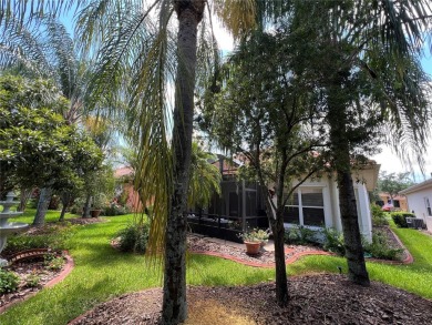 Beautifully maintained home in Solivita. Gorgeous landscaping on Stonegate Golf Club in Florida - for sale on GolfHomes.com, golf home, golf lot