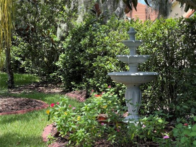 Beautifully maintained home in Solivita. Gorgeous landscaping on Stonegate Golf Club in Florida - for sale on GolfHomes.com, golf home, golf lot