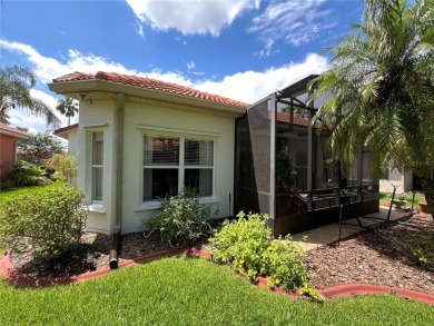 Beautifully maintained home in Solivita. Gorgeous landscaping on Stonegate Golf Club in Florida - for sale on GolfHomes.com, golf home, golf lot