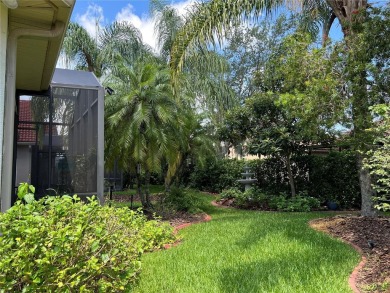 Beautifully maintained home in Solivita. Gorgeous landscaping on Stonegate Golf Club in Florida - for sale on GolfHomes.com, golf home, golf lot