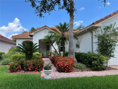 Beautifully maintained home in Solivita. Gorgeous landscaping on Stonegate Golf Club in Florida - for sale on GolfHomes.com, golf home, golf lot